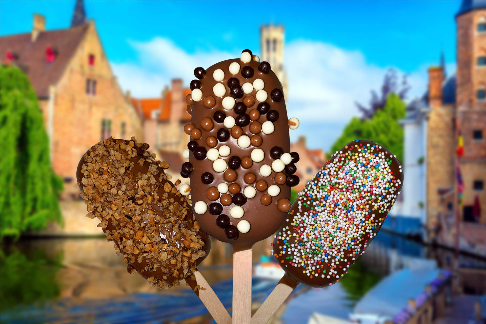 Three different customized Go.fre ice creams-on-a-stick in front of the Belfort of Bruges.